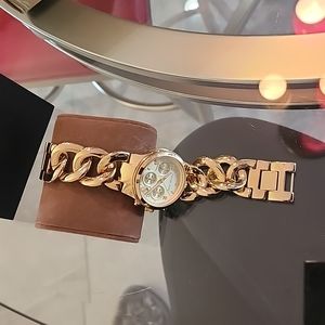 Watch and box. Gold and worn only a few times.